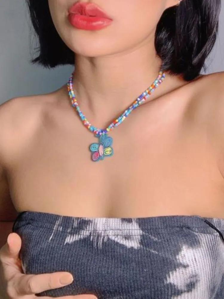 A colorful long double bead butterfly pendant jewelry suitable for daily wear and holiday gifts