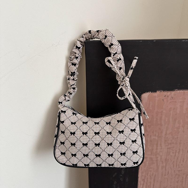 

Beautiful casual summer popular versatile lightweight design sense handbag portable bow shoulder armpit bag хаки