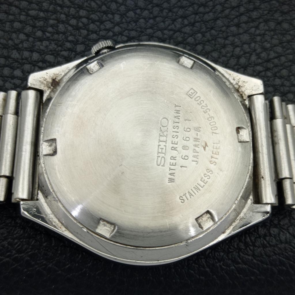 GENUINE VINTAGE SEIKO 5 AUTOMATIC JAPAN 7009A MENS BLACK DIAL WATCH A702332-5 R124-a702332