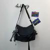 Men's Solid Canvas Crossbody Bag with Cartoon Charm Large Capacity Casual Shoulder Bag for Daily Work Commute