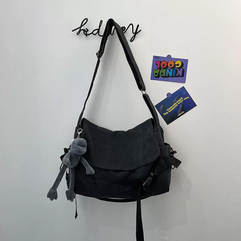 Men's Solid Canvas Crossbody Bag with Cartoon Charm Large Capacity Casual Shoulder Bag for Daily Work Commute
