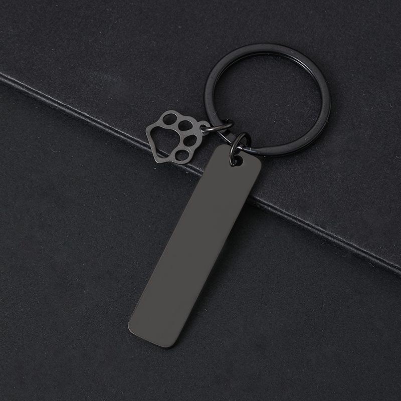 Breloczek do kluczy z łapą psa drukowaną laserowo - Międzynarodowy metalowy prezent