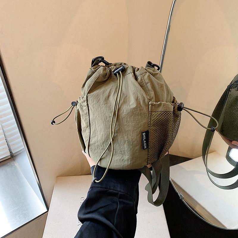 

Casual niche shoulder bag, messenger bag, small cloth bag, mobile phone bag, women s casual versatile mini bucket bag зелений