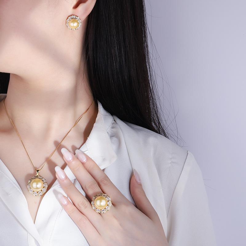 New European and American retro inlaid yellow pearl gold pendant necklace ring stud earrings temperament women's suit