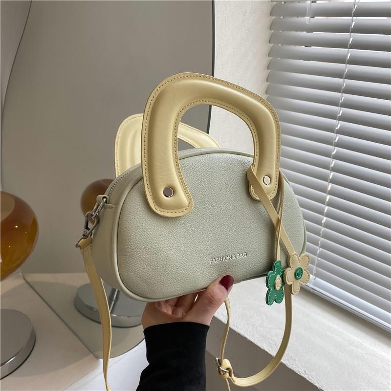 

Популярная в этом году нишевая дизайнерская сумка 2025 новая женская сумка универсальная сумка-мессенджер портативная сумка-ракушка зелёный