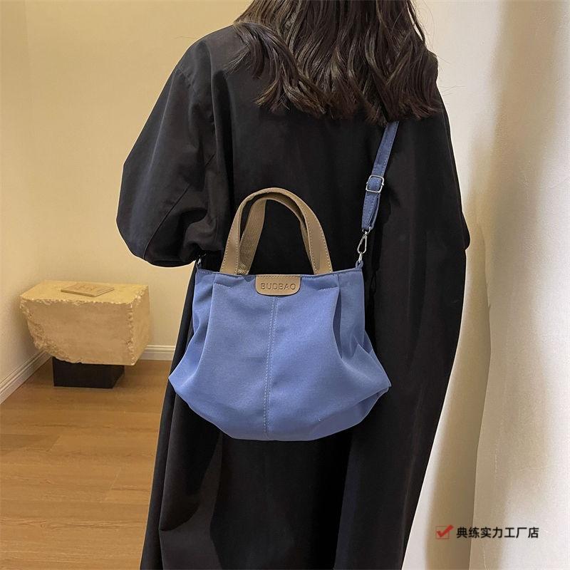 Casual canvas bag women's new versatile simple shoulder handbag fashionable large-capacity student class shoulder bag