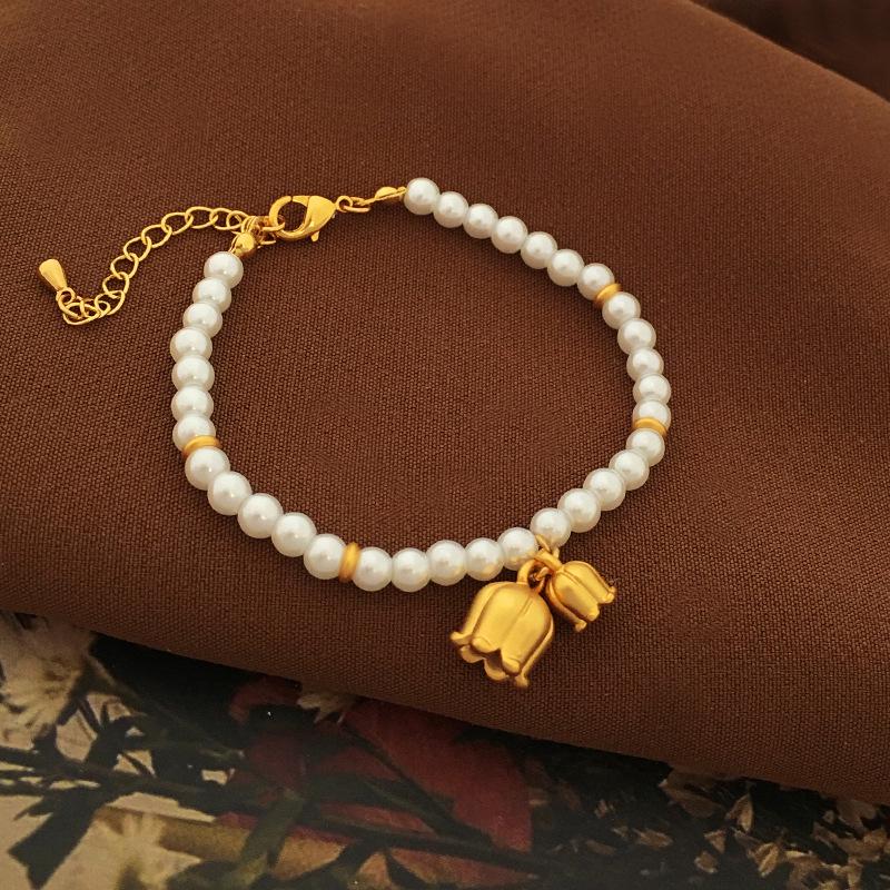 Copper-Plated Gold Lily of the Valley Pearl Bracelet - Elegant French Style Clavicle Chain for Women