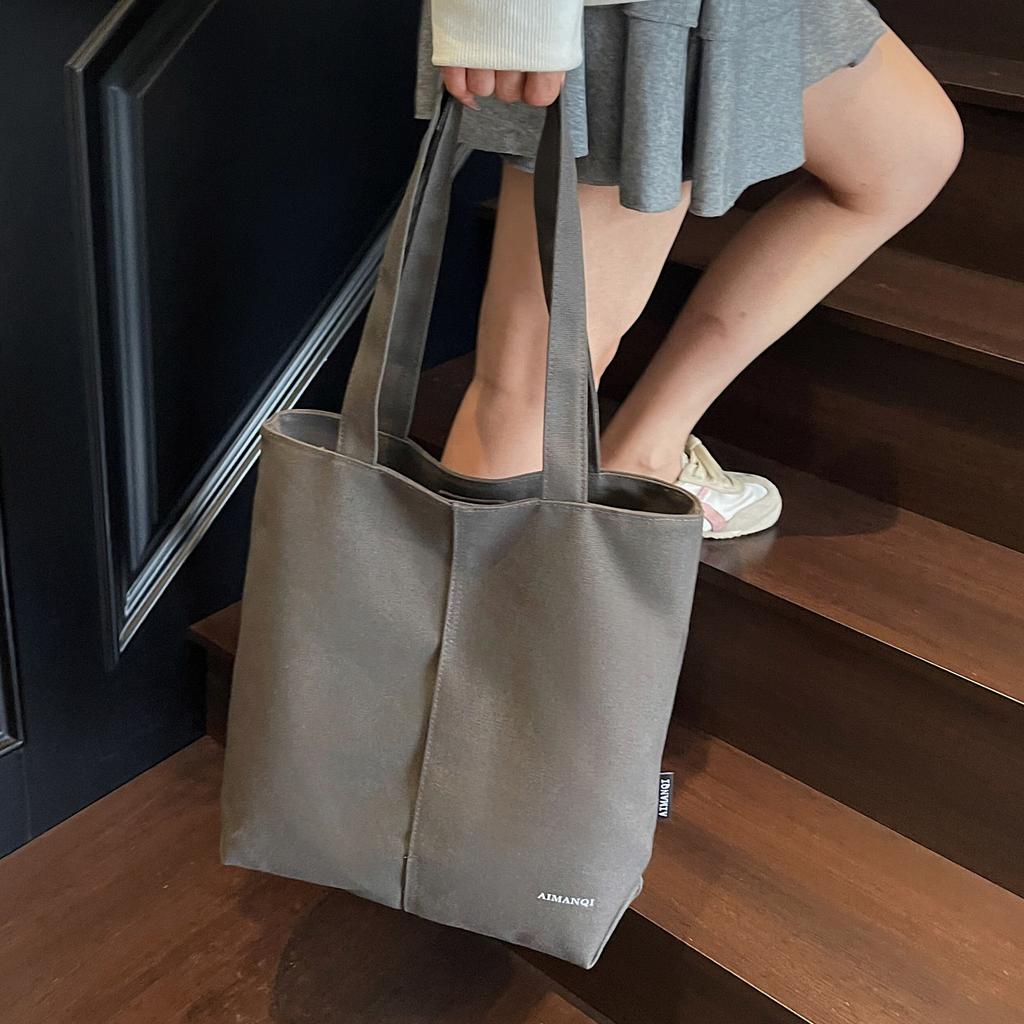 Fashion trend casual simple large capacity canvas bag 2025 summer new foreign style women shoulder tote bag