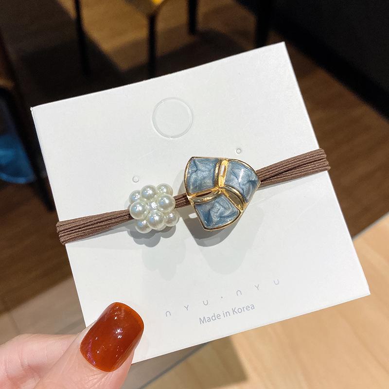 

2024 Жемчужная повязка для волос: Элегантная повязка на голову в японском стиле с шикарным жемчужным акцентом clover темно-синий