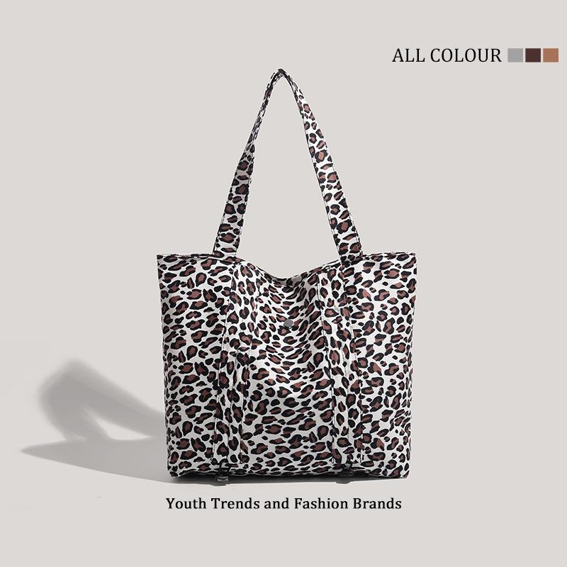 

Leopard print canvas shoulder bag women s new large-capacity portable college student class commuter bag