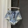 2026 Europäische High-Waist Schlankmachende Zerrissene Denim A-Linien-Shorts für Damen