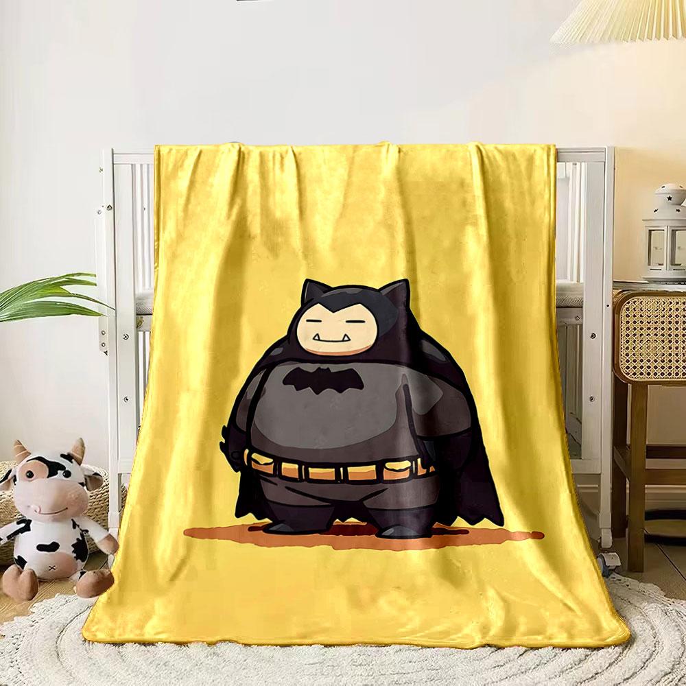 

A chubby cartoon figure dressed as a superhero in a bat-themed costume. for all seasons blanket lunch break throw gift 80cm x 120cm