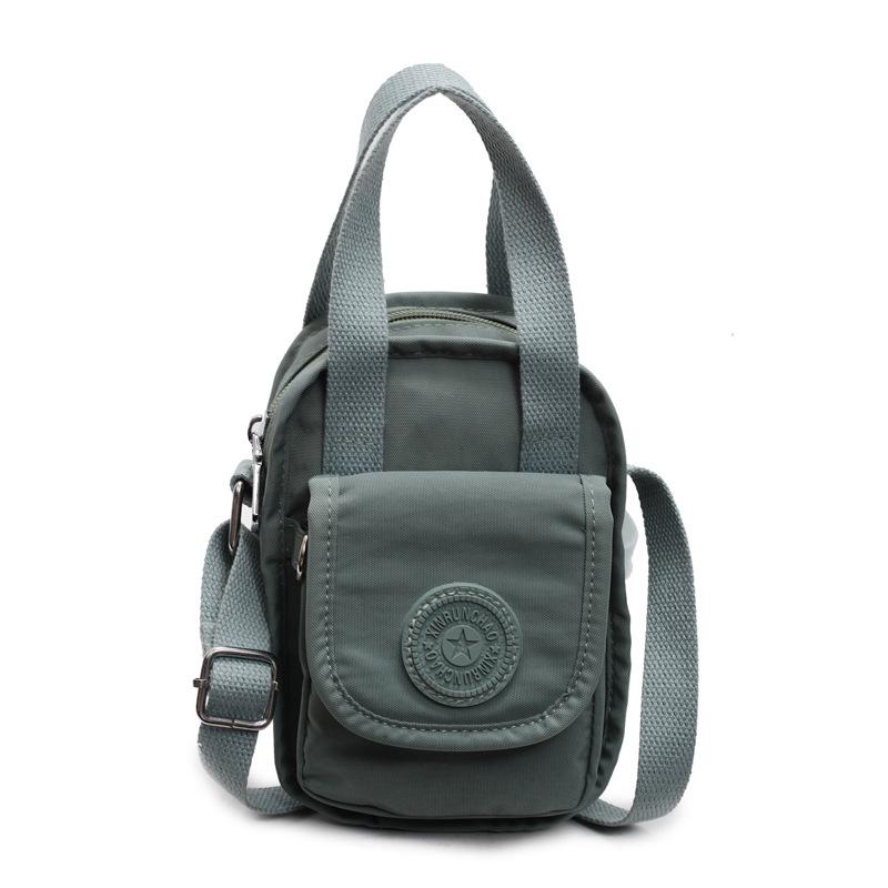 A Stylish Water-resistant and Simple Crossbody Women's Bag for Casual Commuting