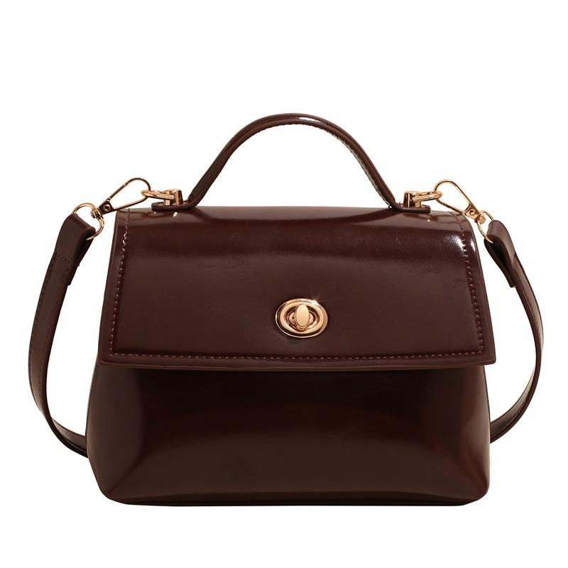 

Премиальная сумка нишевая текстура простая атмосфера кремовый ветер откидной замок женская портативная сумка-мессенджер