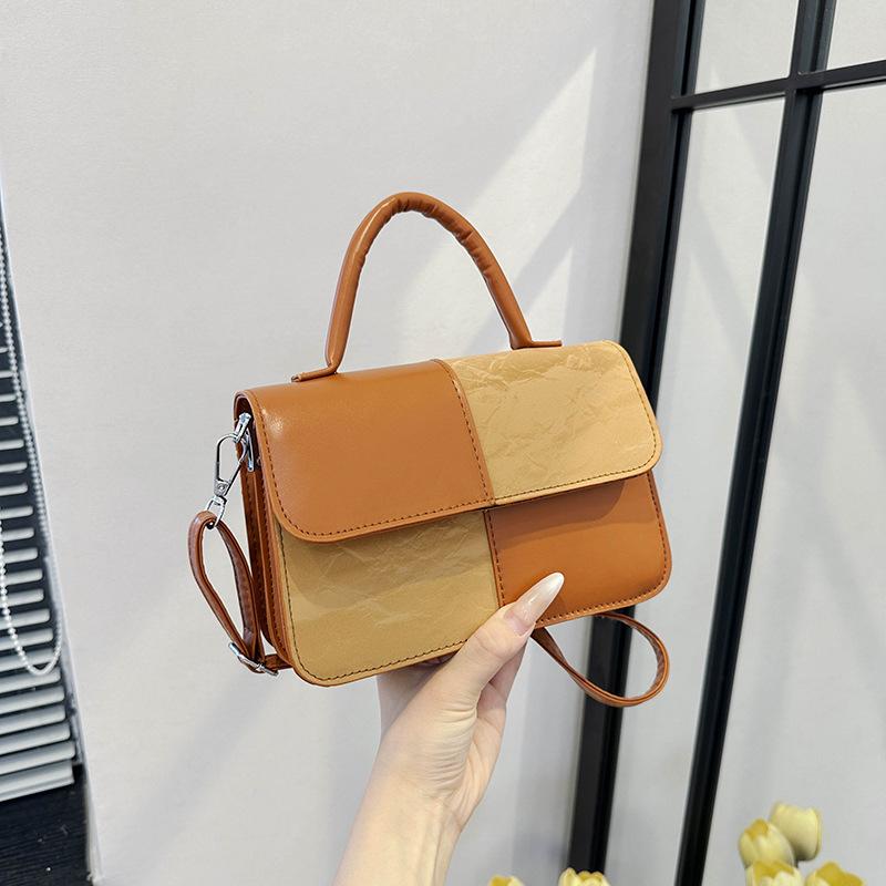 

Splicing contrasting colors fashionable women s bags 2025 new foreign style portable shoulder messenger bag portable small square bag wholesale
