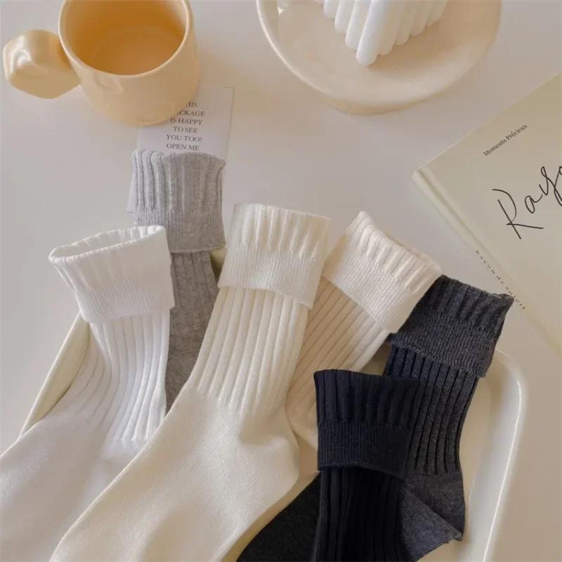 Chaussettes en Tricot de Coton pour Femmes Style Japonais Chaussettes Hautes pour Écolières Mode Coréenne Couleur Unie Noir Blanc Gris Chaussettes Longues