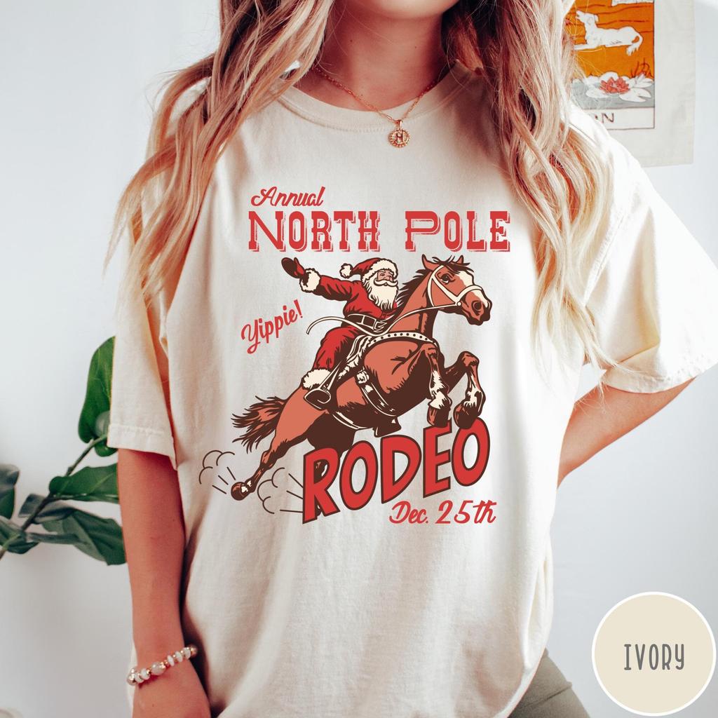Retro Western Christmas T-Shirt, North Pole Rodeo Shirt, Retro Western Shirt, Women's Christmas Tshirt, Trendy Santa Shirt