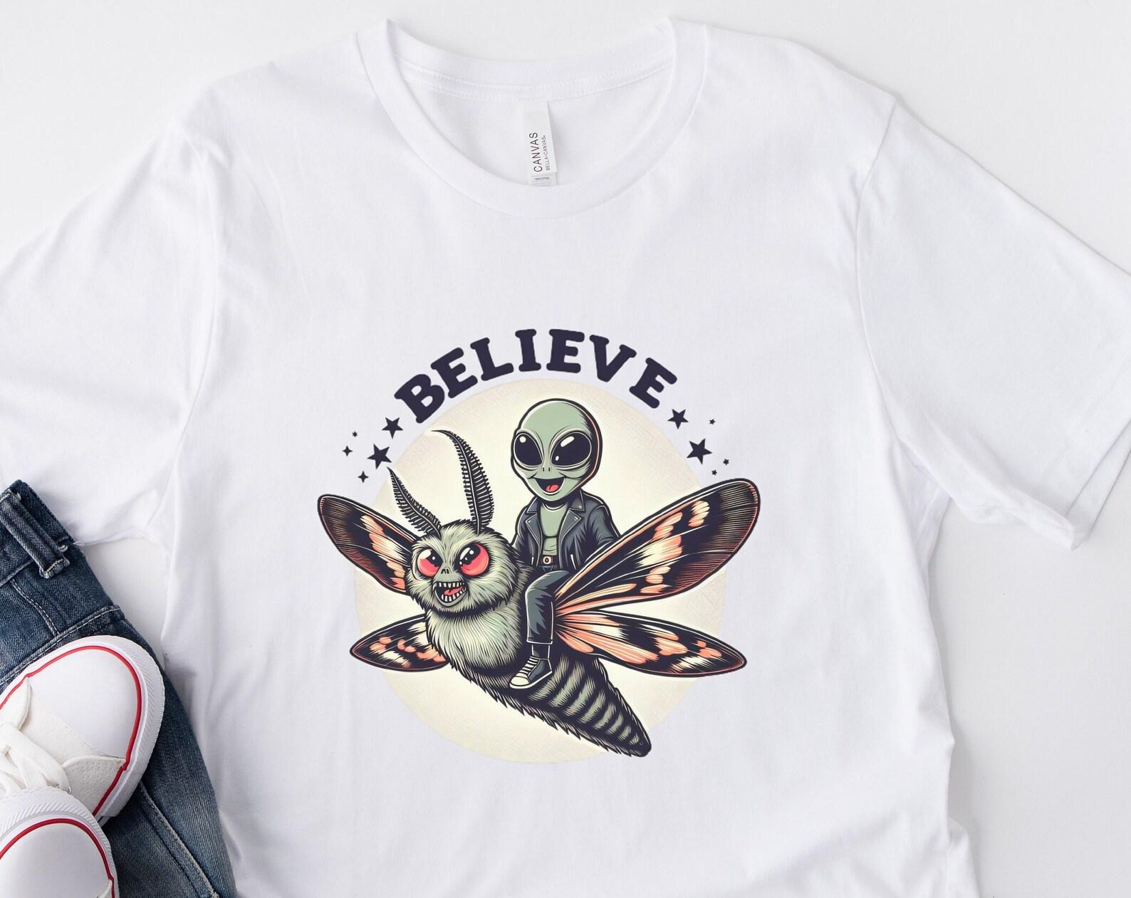 Funny Alien Riding Mothman T-Shirt: Unisex Cryptid Tee XL