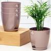 Sett med 4 selvvannende blomsterpotter for planter | Plastblomsterpotter | Plantepotter for hjem, innendørs stue, hage