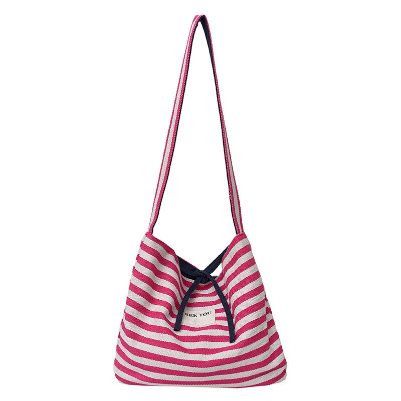 2025 new Korean casual lazy wind contrasting color striped tote bag large-capacity commuter versatile messenger women's bag