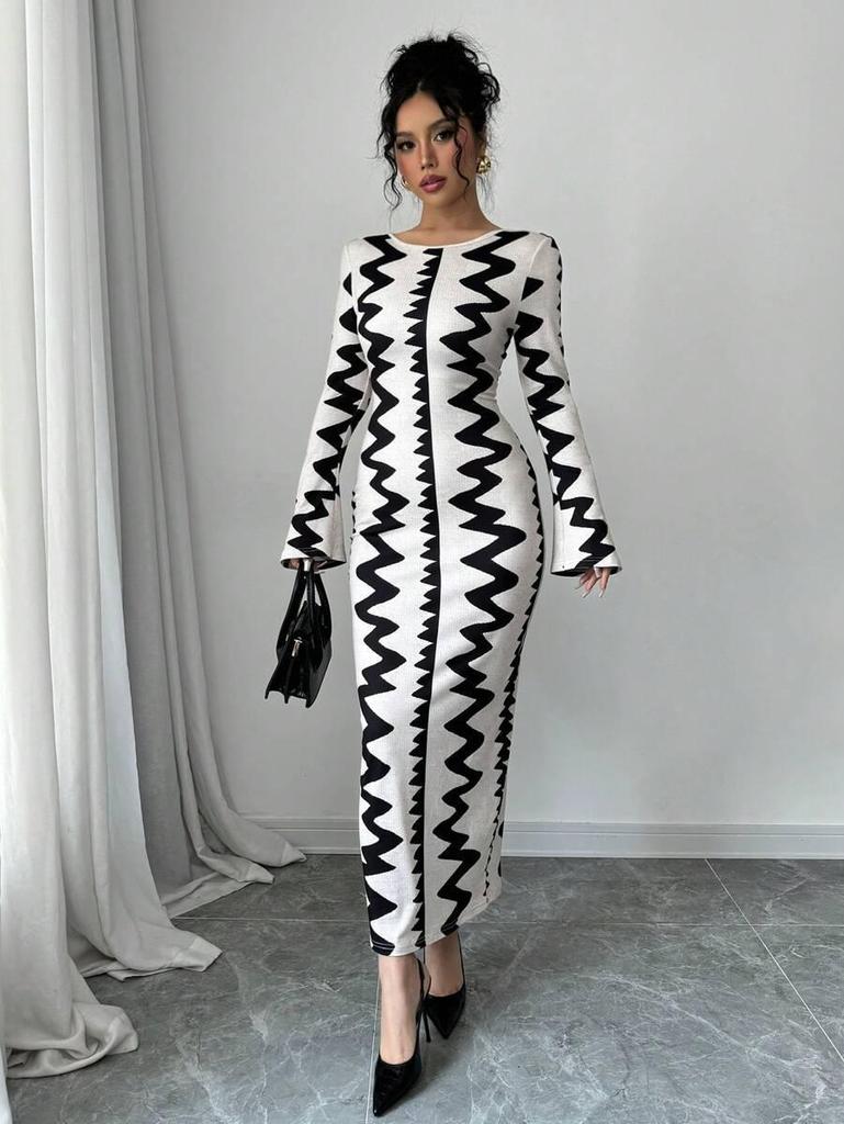 Evropské a americké podzim/zima 2025 přiléhavé šaty s černobílým potiskem, kulatým výstřihem a dlouhými rukávy