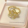 A Japanese and Korean style four-leaf flower ring with zirconia that can be rotated-Fashionable, light-luxury, minimalist geometric rings are