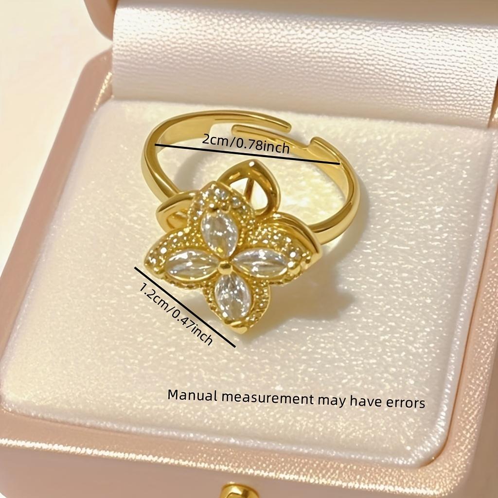 A Japanese and Korean style four-leaf flower ring with zirconia that can be rotated-Fashionable, light-luxury, minimalist geometric rings are