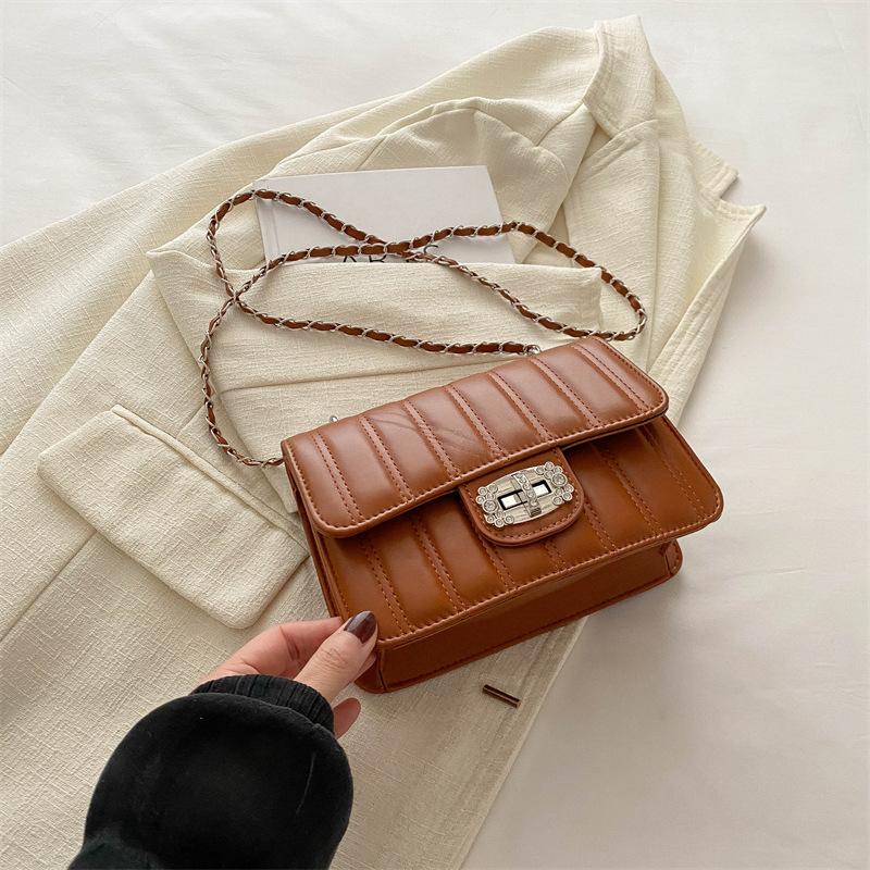 

Lock temperament commuter small bag women s 2025 spring and summer new versatile ins Korean version of versatile ins messenger small square bag коричневый