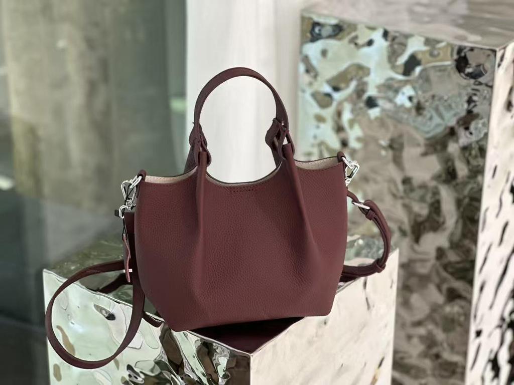 Elegant Women's Genuine Cowhide Bucket Handbag - Versatile Single Shoulder & Crossbody Style.