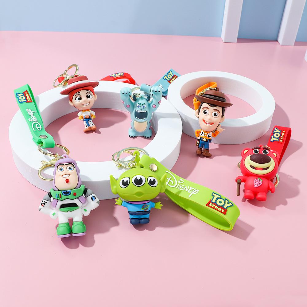 Best-Selling Toy Story Figures Keychain: Three-Eyed Alien, Buzz Lightyear, and Strawberry Bear Charms
