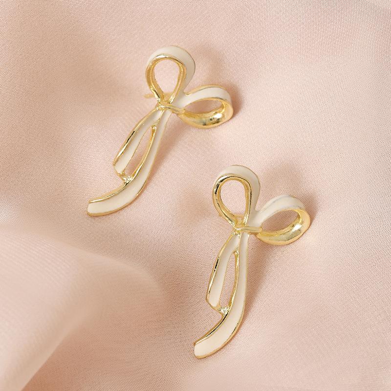 Purple bow retro French S stud earrings elegant Hong Kong style temperament белый