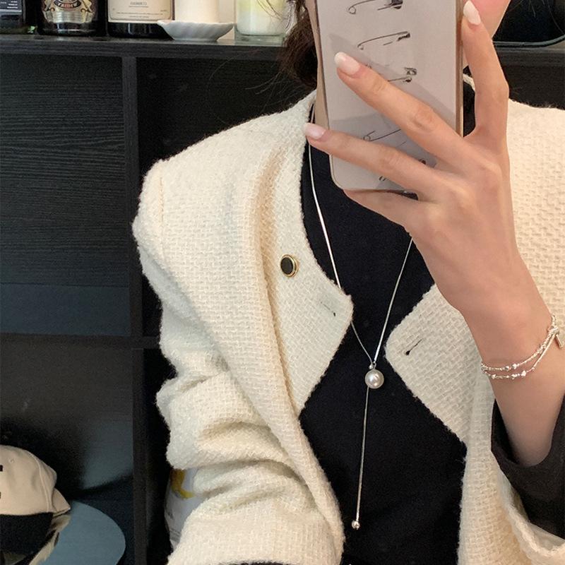 Pure Silver Pullable Long-style Pearl Necklace for Women, in A Cold and Elegant Style, with A Simple Sweater Chain for Pulling.