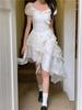 Coffee break French first love white irregular dress women's 2026 summer super fairy seaside vacation princess dress small man