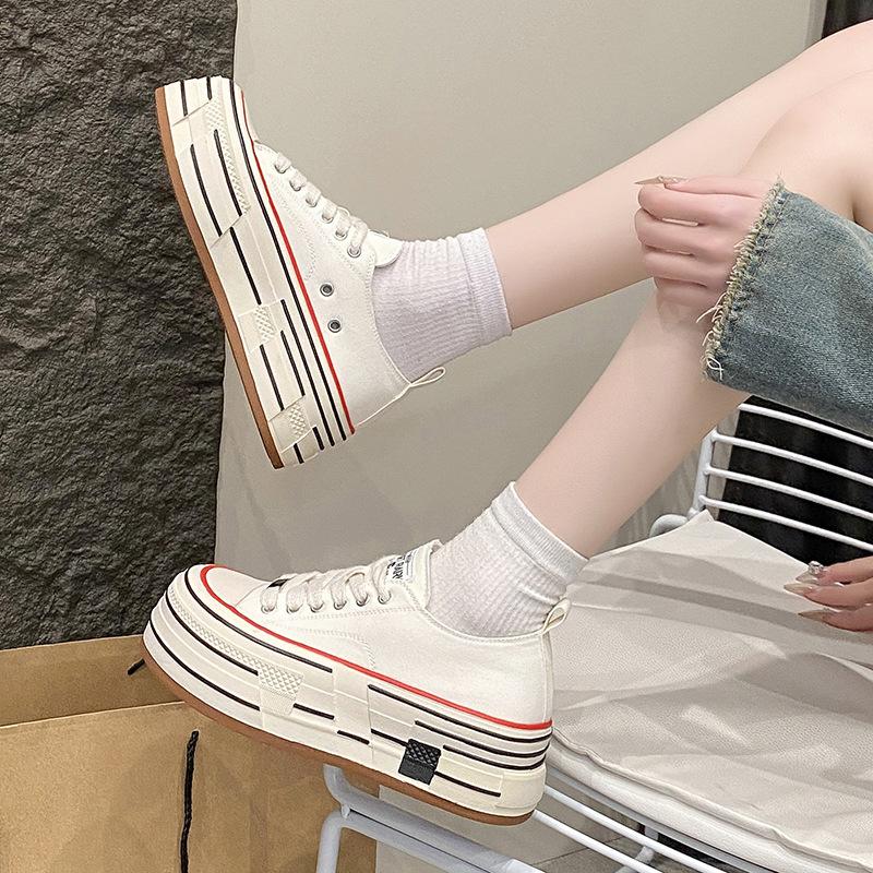 Popular high-value thick-soled muffin heightening little white shoes canvas shoes niche design high-end casual sports shoes