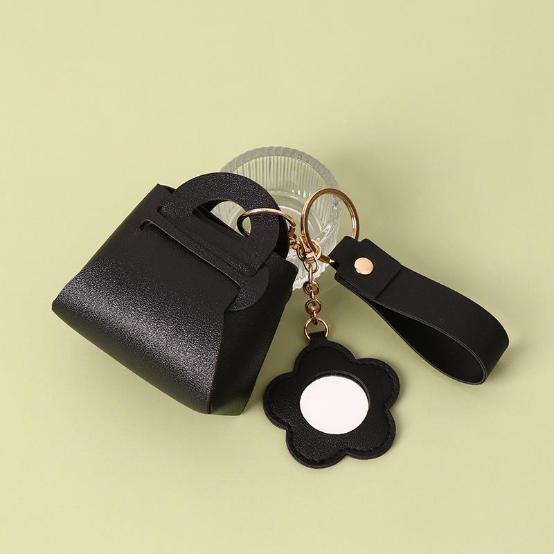 Korean Style Creative PU Leather Keychain: Mini Mirror, Storage Bag, Solid Color Wallet