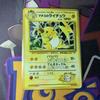 Pokémon Trading Card Swirl Old Raichu Card, Back, Holo, Lt. Surge's