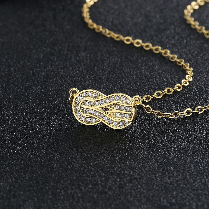 Korean version of fashion temperament rotating peanut bean necklace women's niche design chain versatile jewelry