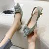 Baotou sandals women's new summer rhinestone square buckle fairy wind back empty French thin heel high heel pointed single shoes