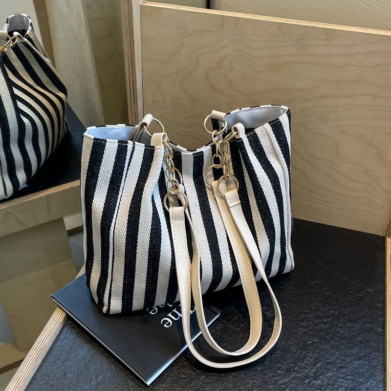 Striped large-capacity fashion handbag 2025 spring new versatile ins shoulder underarm bag tote bag