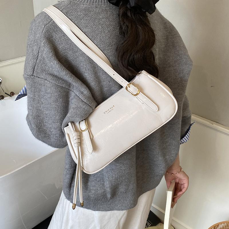 

Винтажная нишевая сумка Boston женская 2025 новая трендовая корейская сумка подмышку простая сумка на плечо портативная сумка для поездок белый