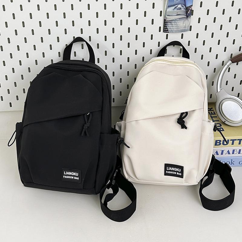 Schoolbag Korean version of simple small backpack versatile messenger bag men's casual men's sports breast bag women's large-capacity student shoulder