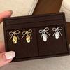 Exquisite Sweet Bow Sequin Pendant Earrings for Women Girls Fashion Geometric Metal Tassel Earrings Wedding Statement Jewelry