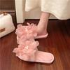 Design sense pearl one-word slippers women's autumn 2025 high-value flower drag with skirt thick-soled women's slippers