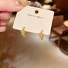 Geometric Hollow Flower Zircon Stud Earrings for Women – Elegant and Versatile Design