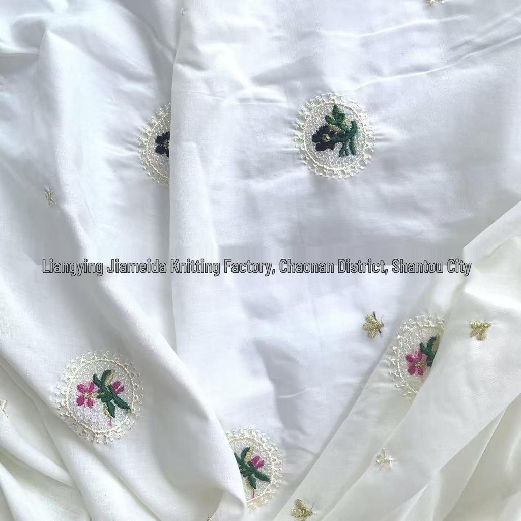 Light Apricot Cotton Fabric with Small Embroidered Flowers - Fresh Style for Women's Clothing and Children's Bags.
