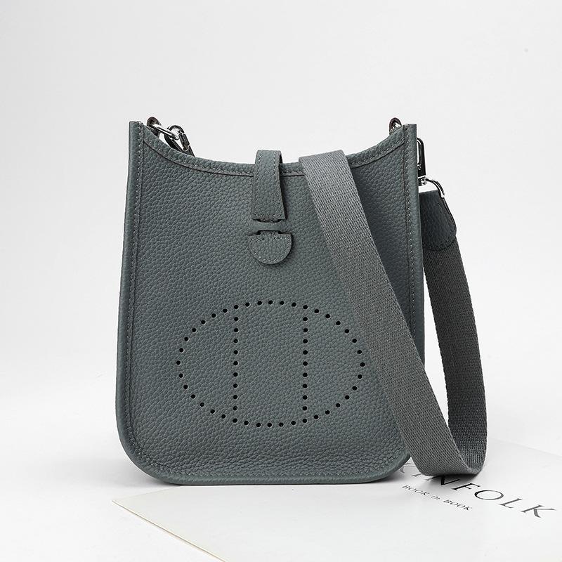 Factory wholesale first layer togo cowhide bucket bag women's bag lychee pattern hollow single shoulder crossbody bag hollow design