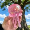 Nee Doh Jelly Squish-Super Solid Squish Stress Ball, Glitter Filled Jellyfish Fidget Toy for Anxiety Relief, Soft Squeeze Sensory Toy for Kids  Adults