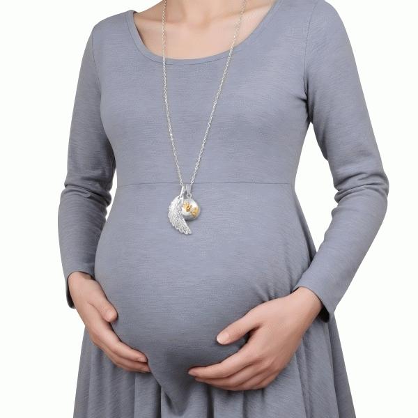 Bola de grossesse aile d'ange et boule avec empreintes bébé