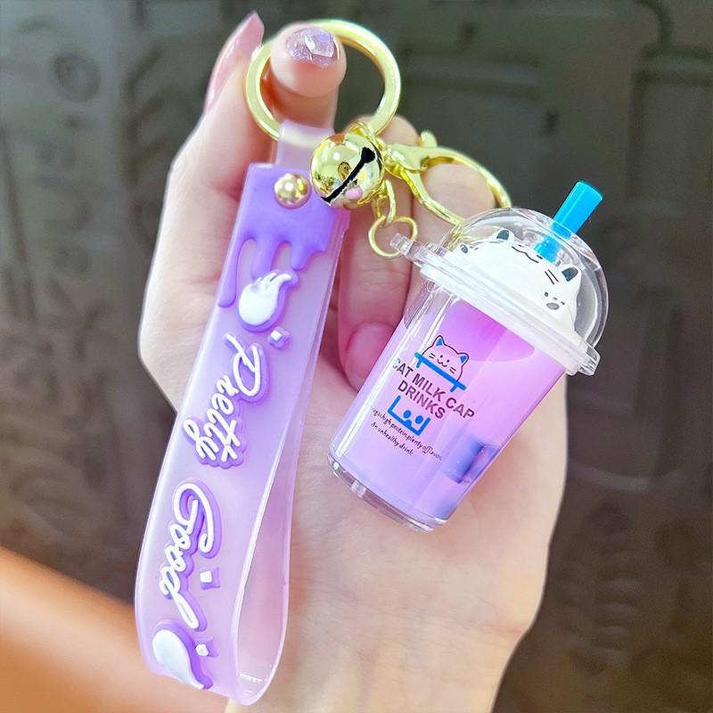 Exquisite Quicksand Panda Keychain: Cartoon Oil-Filled Doll Bag Pendant and Car Accessory