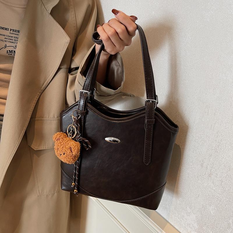 

Модна велика сумка-тоут жіноча трендова сумка під пахву 2025 осінь нова проста трендова сумка на плече 27*9*23 темно-коричневого кольору